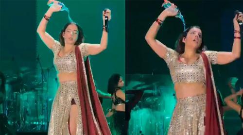 ভরা মঞ্চে চটুল ভঙ্গিতে গায়ে জল ঢেলে বিতর্কে ‘ধুরন্ধর’ গায়িকা!