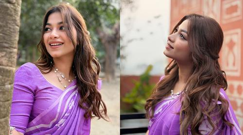 বেগুনি রঙের শাড়িতে নজর কাড়লেন অভিনেত্রী পারসা