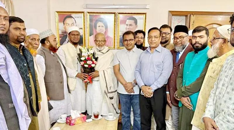 ড. মোশাররফকে জামায়াতের পরাজিত প্রার্থীর ফুলেল শুভেচ্ছা